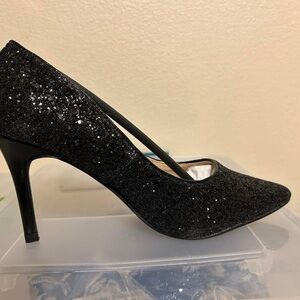 Women’s Black Pumps and Black Clutch